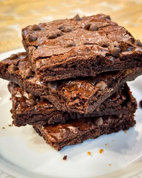 A stack of fudgy choco chip millet brownies